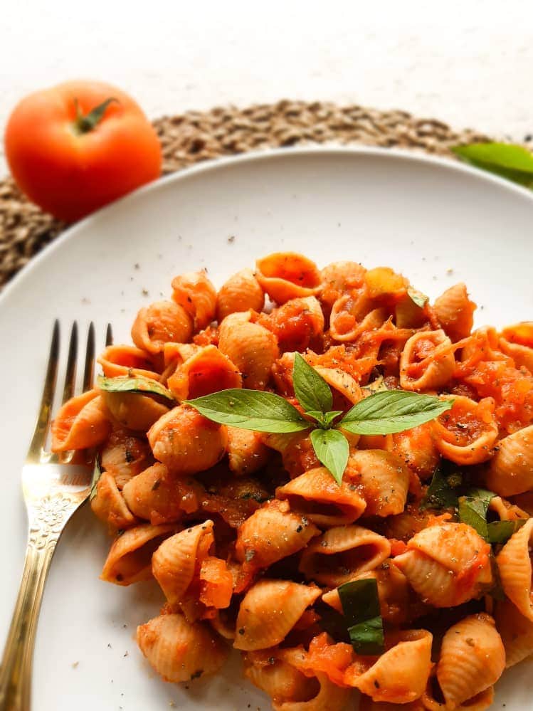 A close up shot of tomato pasta