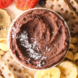 Close up of vegan chocolate dip in a white bowl.