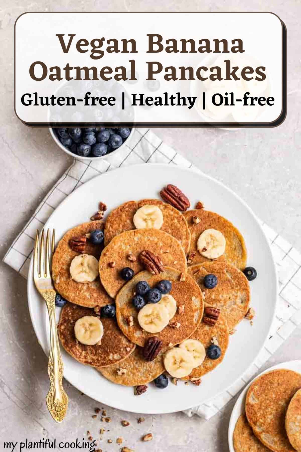A plate of pancakes topped with banana slices, blueberries and pecans with a fork beside with text overlay.