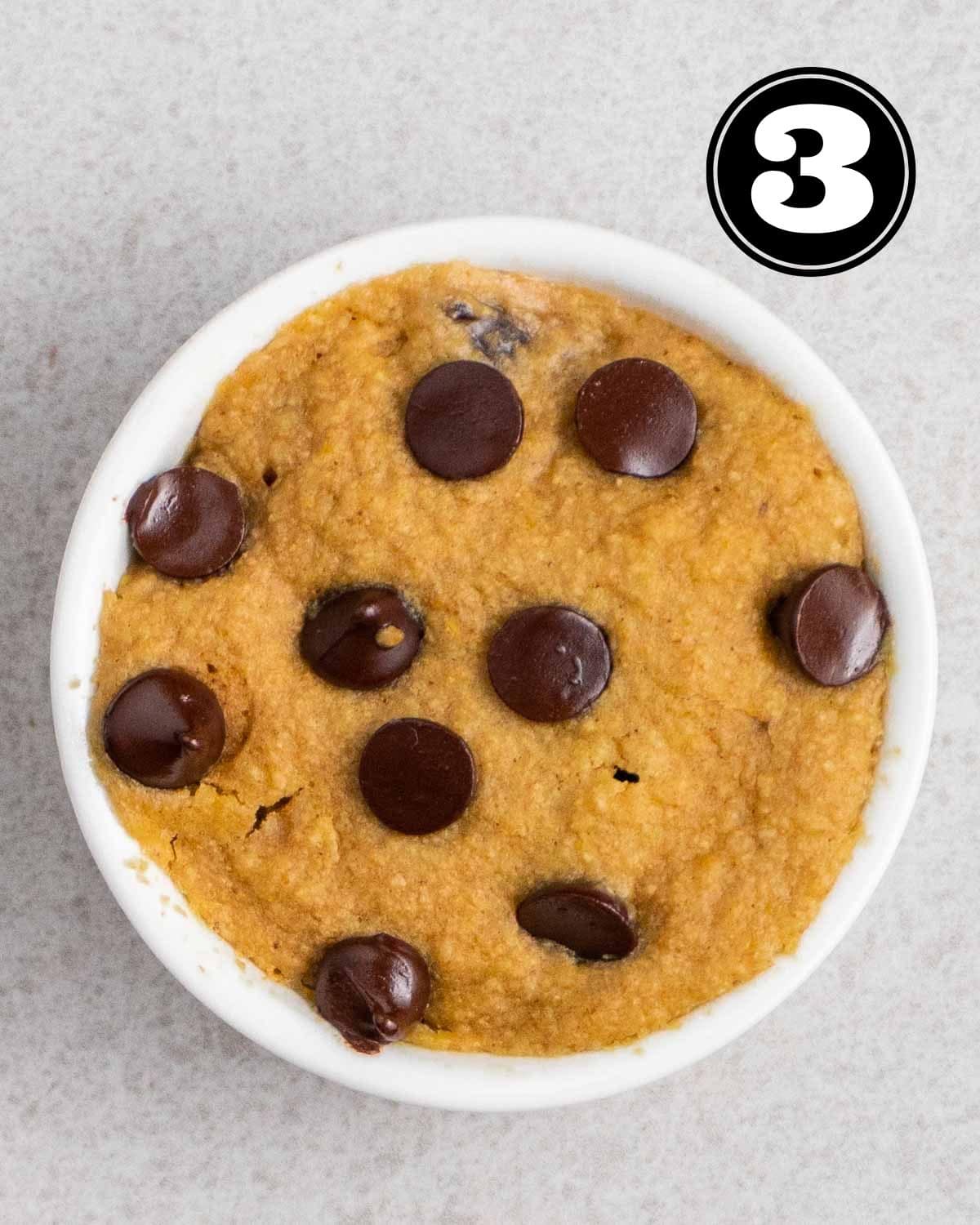 A ramekin of cooked mug cookie.