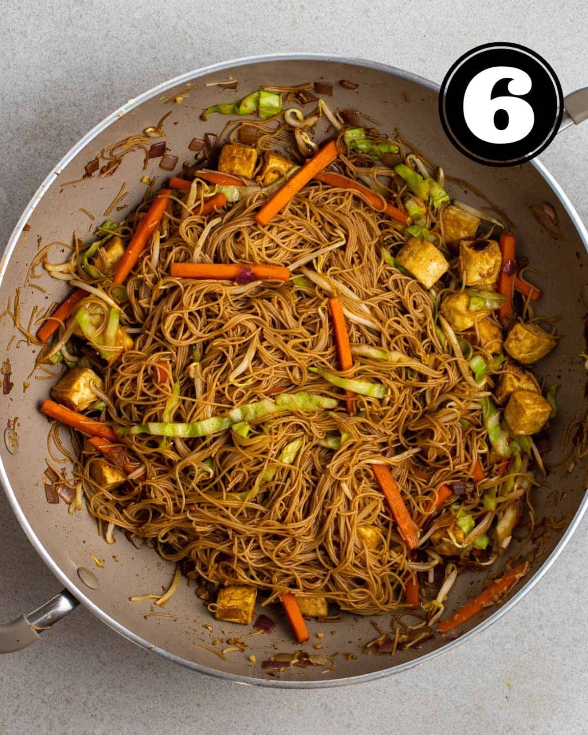 A wok of fried rice vermicelli.
