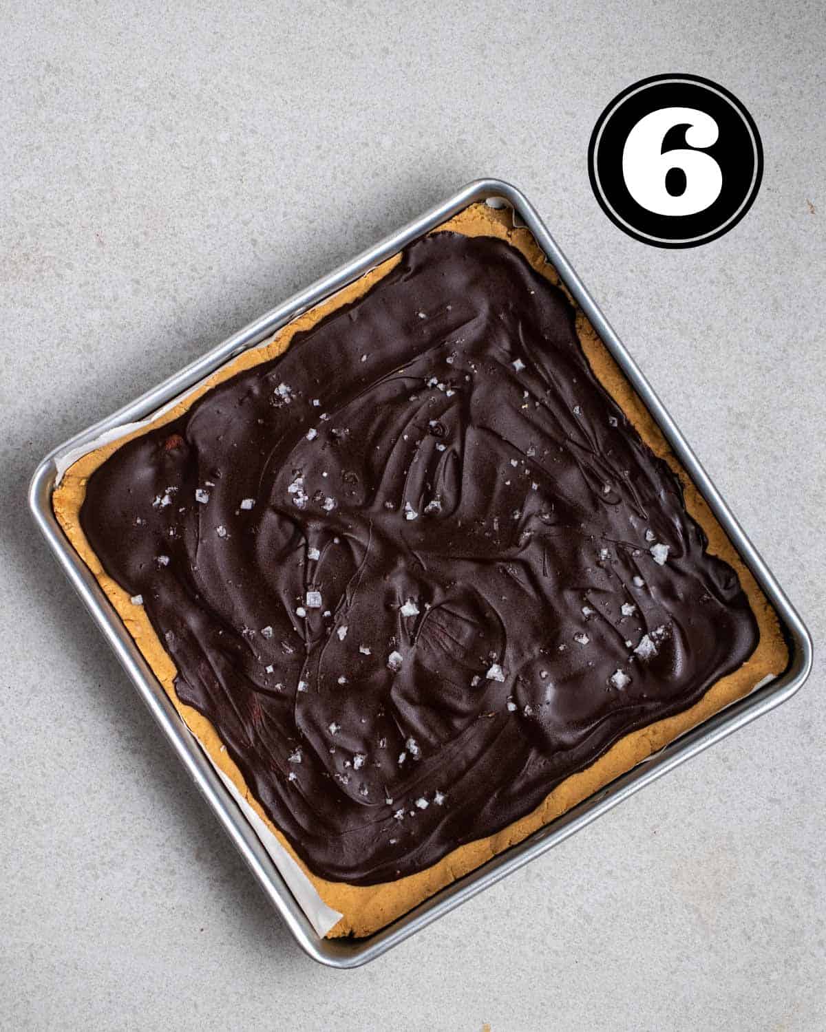 A tray of protein bars topped with flaky sea salt.