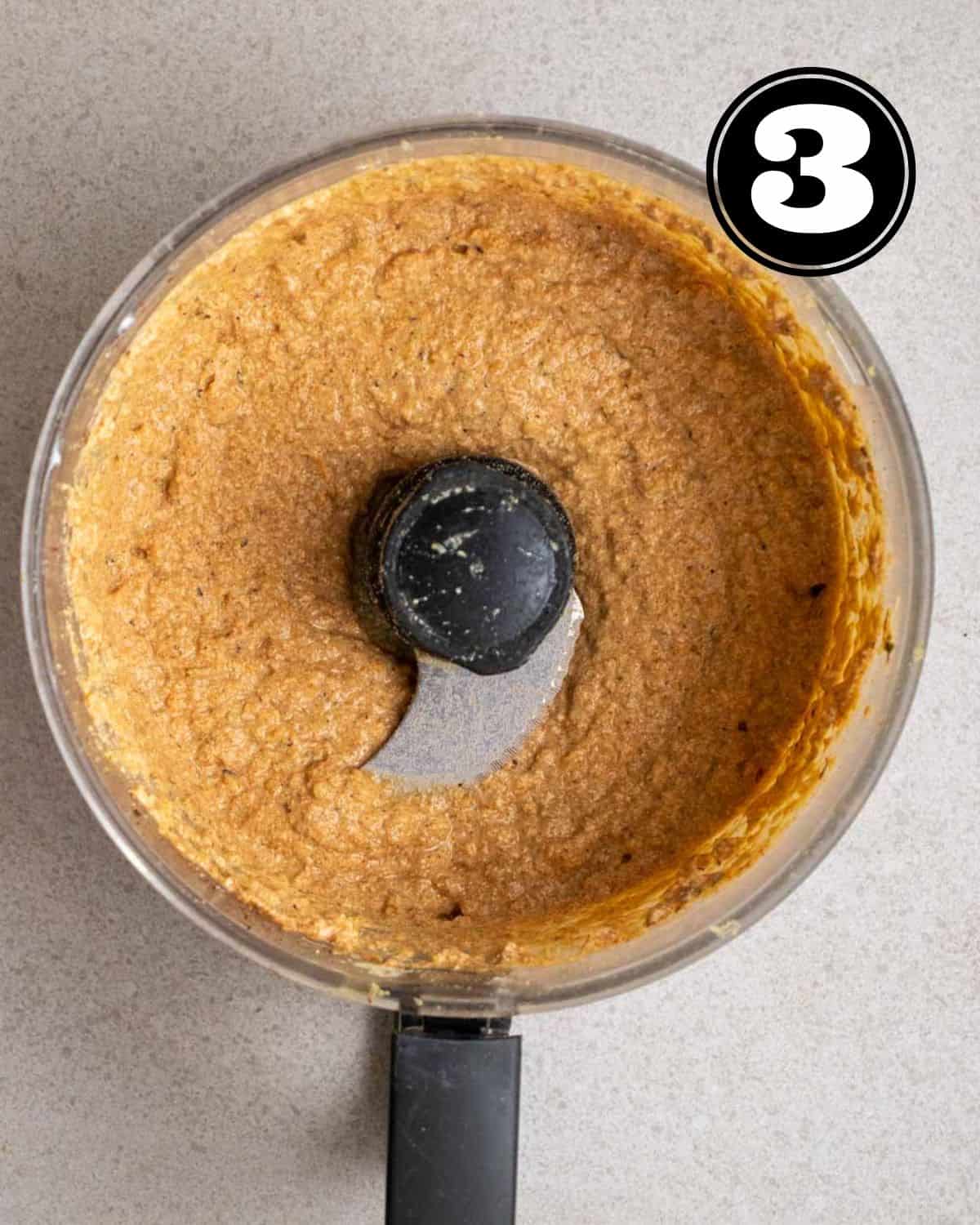 Wet ingredients for vegan Italian sausages in a food processor. 