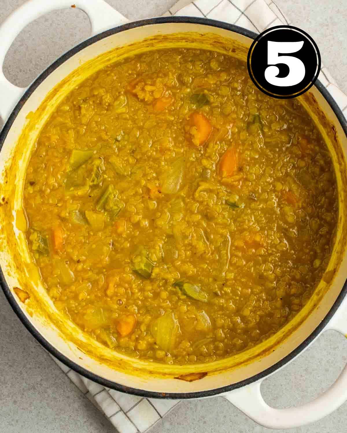 A pot of lentil carrot soup.