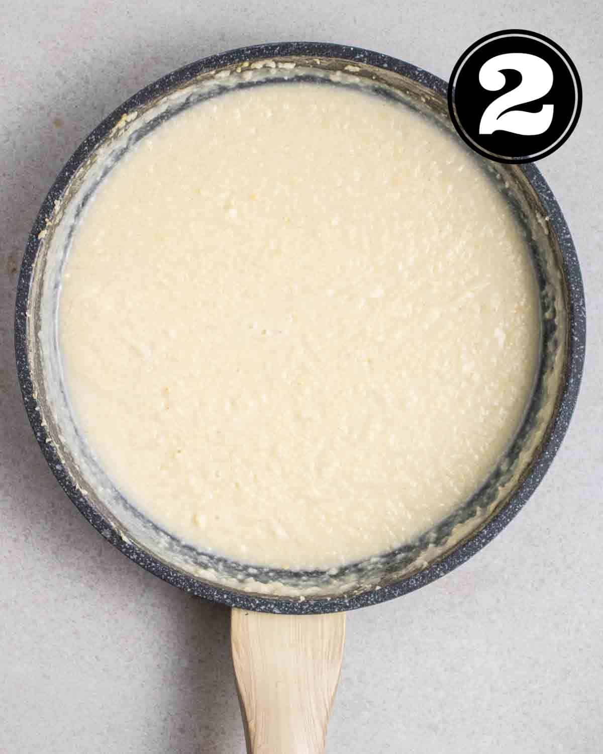 Cooked millet in a pan.