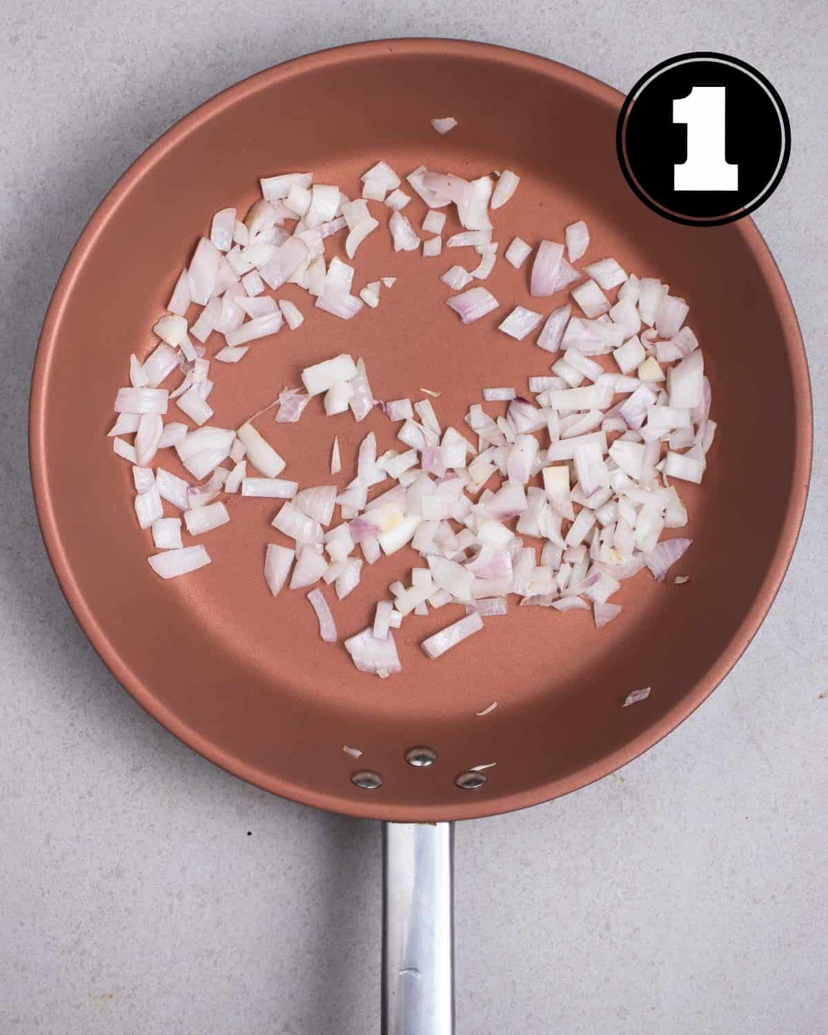 Cooked onion in a pan.