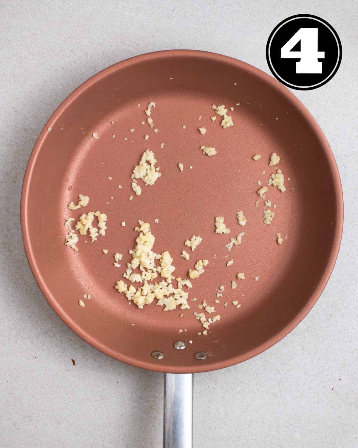 Cooked garlic and ginger in a non-stick pan.