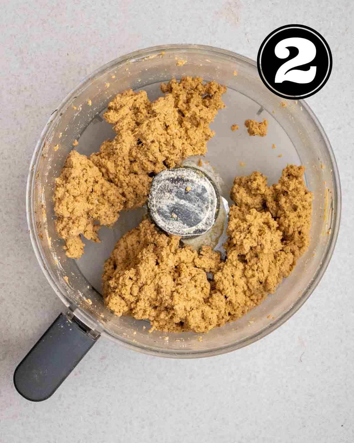 Dough of vegan sausages in a food processor.