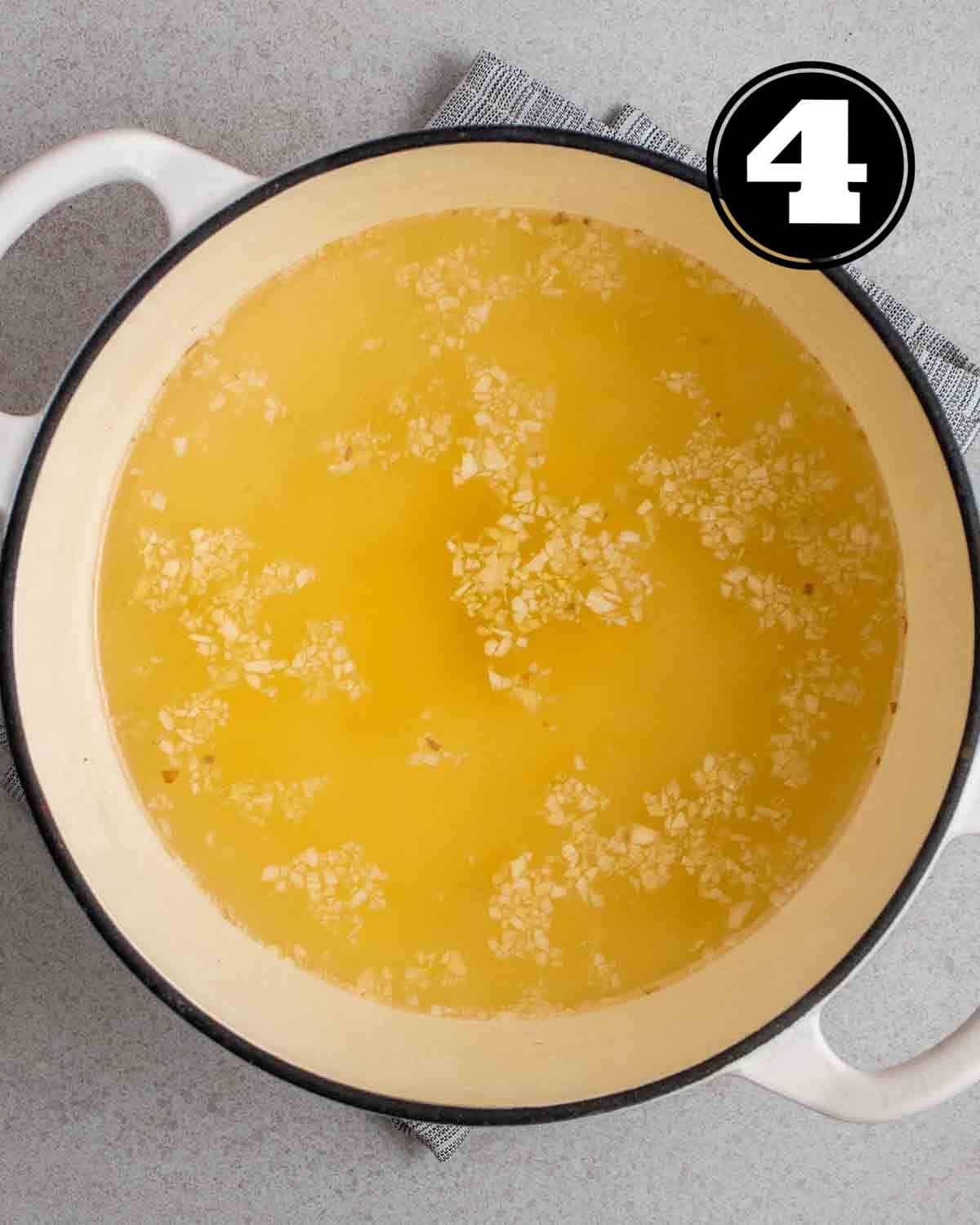 A pot of vegetable broth.